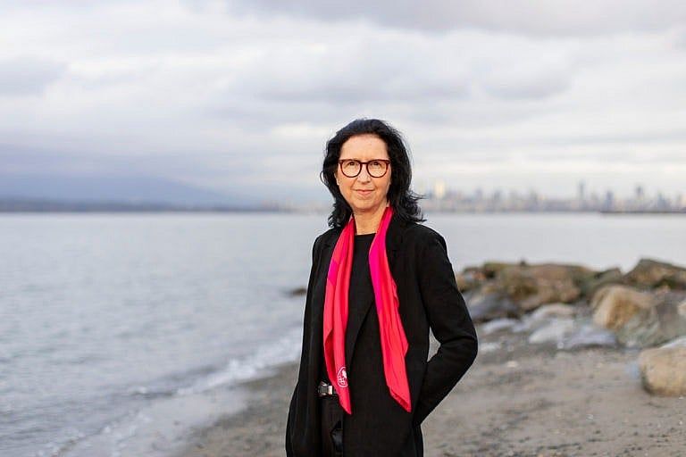 Tricia Smith, president of the Canadian Olympic Committee, stands at Vancouver’s Locarno Beach on March 26, 2021. (Photograph by Alia Youssef)