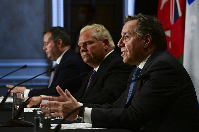 Quebec Premier Francois Legault, right, at a premiers' press conference in Ottawa in September. Ontario Premier Doug Ford, centre, has threatened to use the notwithstanding clause, while Alberta's Jason Kenney has voiced admiration for Quebec's willingness to assert itself. (Sean Kilpatrick/CP)
