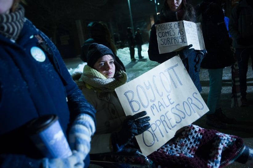 Protesters outside the Kitchener theatre where Bill Cosby performed Wednesday evening. (Cole Garside) 