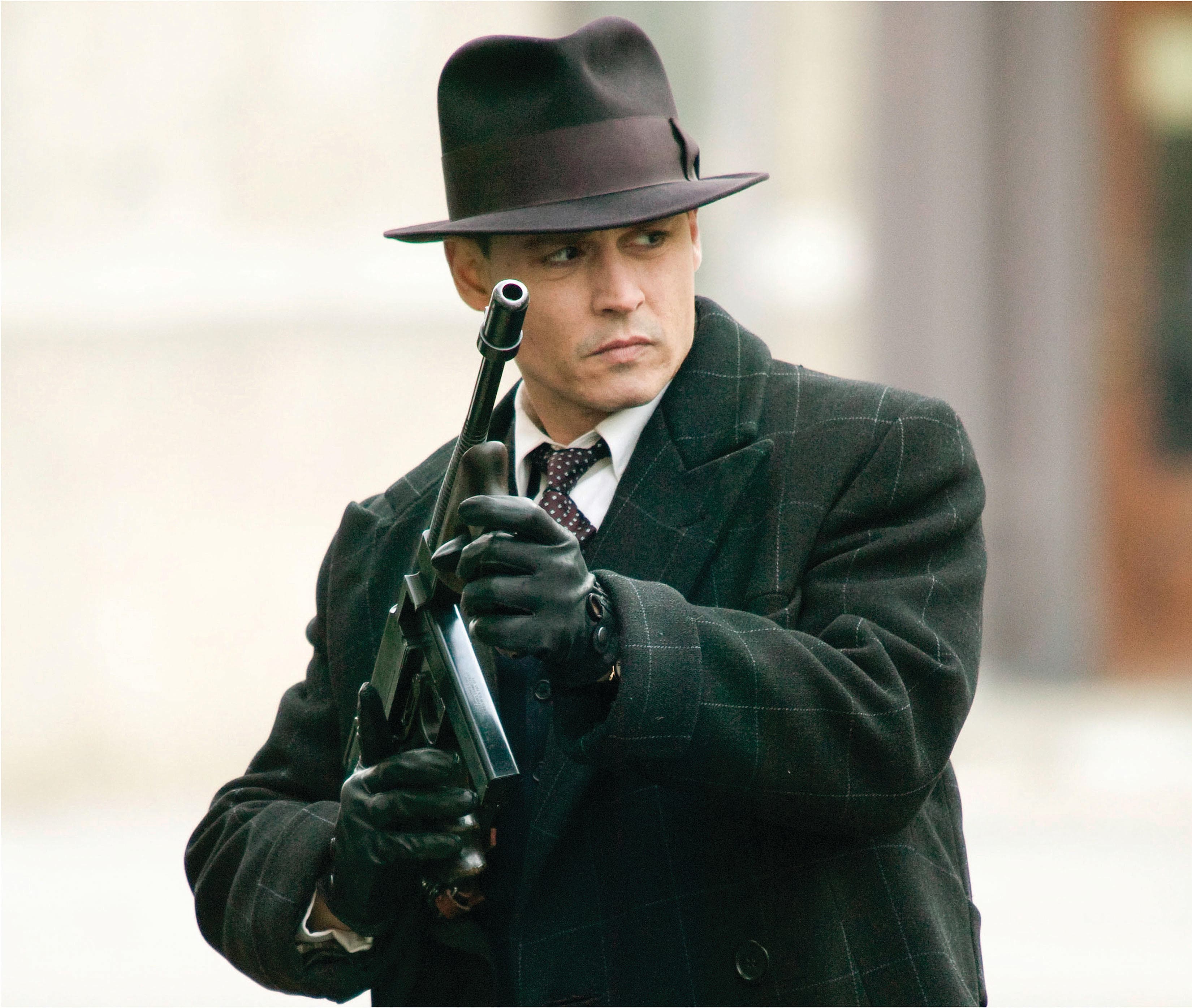 Depp's Dillinger is dead cool
