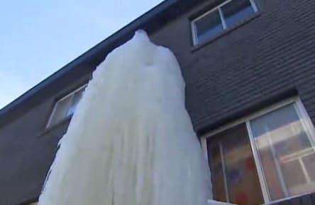 Residents fear wrath of giant icicle on apartment building
