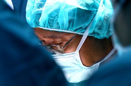 Why are some hospitals more likely to perform C-sections?