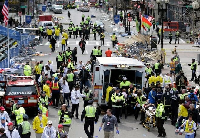 The stories behind five photos from the Boston Marathon bombings