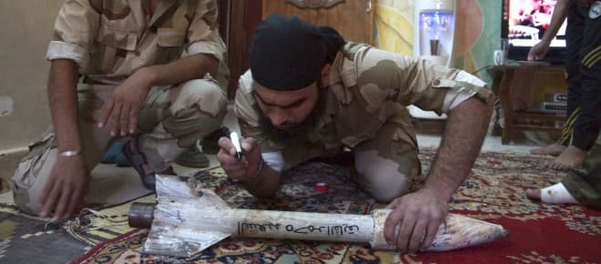 Syrian war nears as Iraq's death toll rises