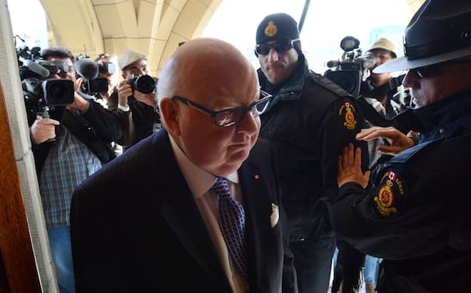 The sketch: Stephen Harper sits down and Mike Duffy stands up