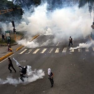 Your morning five: Tear gas on the streets of Venezuela