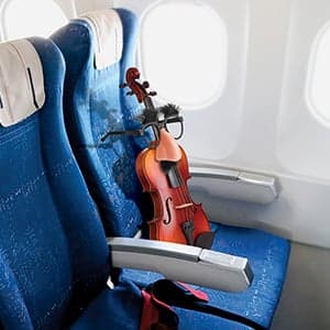 How does a viola cross the ocean?