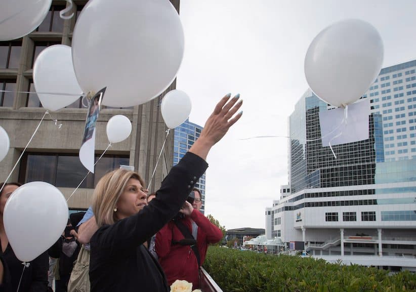 Mourners honour lives of Syrian mother and sons: 'Forgive us'