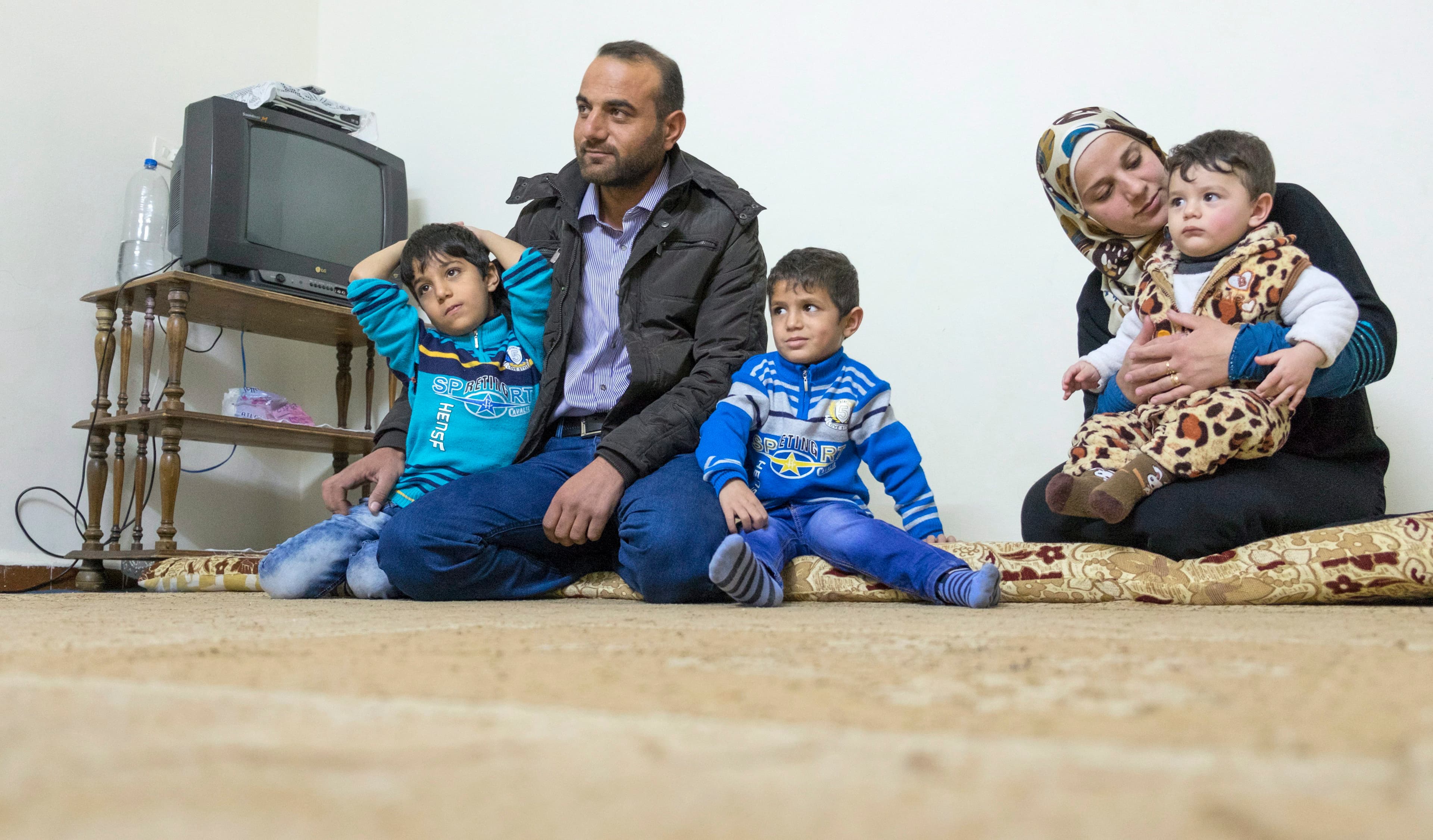 A phone call from Canada is a glimmer of hope for one Syrian refugee family
