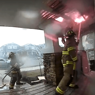 Watch: Fort McMurray firefighters valiantly try to save a home