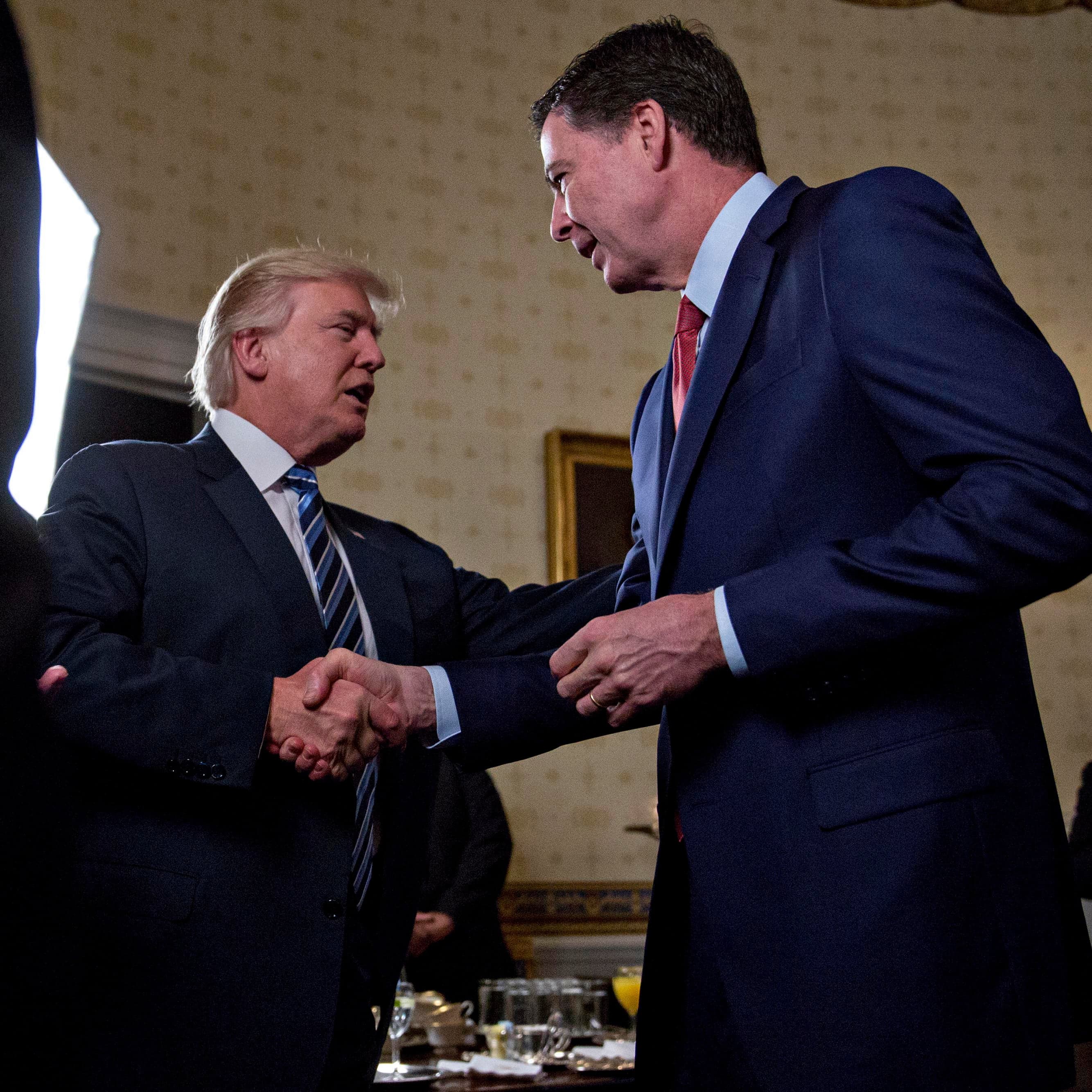 Anatomy of Trump's awkward hug with James Comey