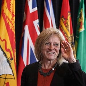 John Horgan misses the premiers' meeting, loses game of inches