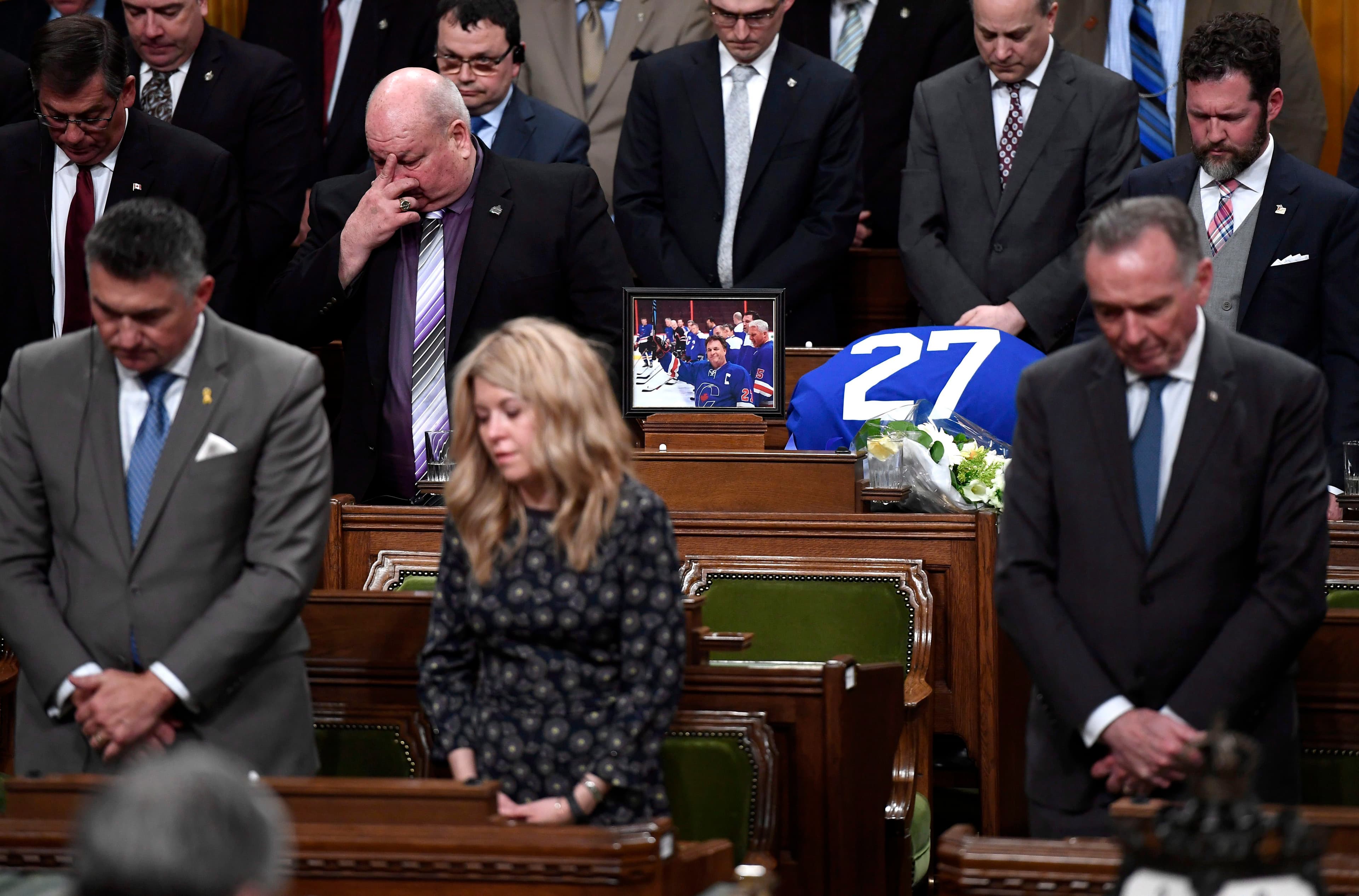 After the death of Tory MP Gord Brown, parliamentarians console their seatmates