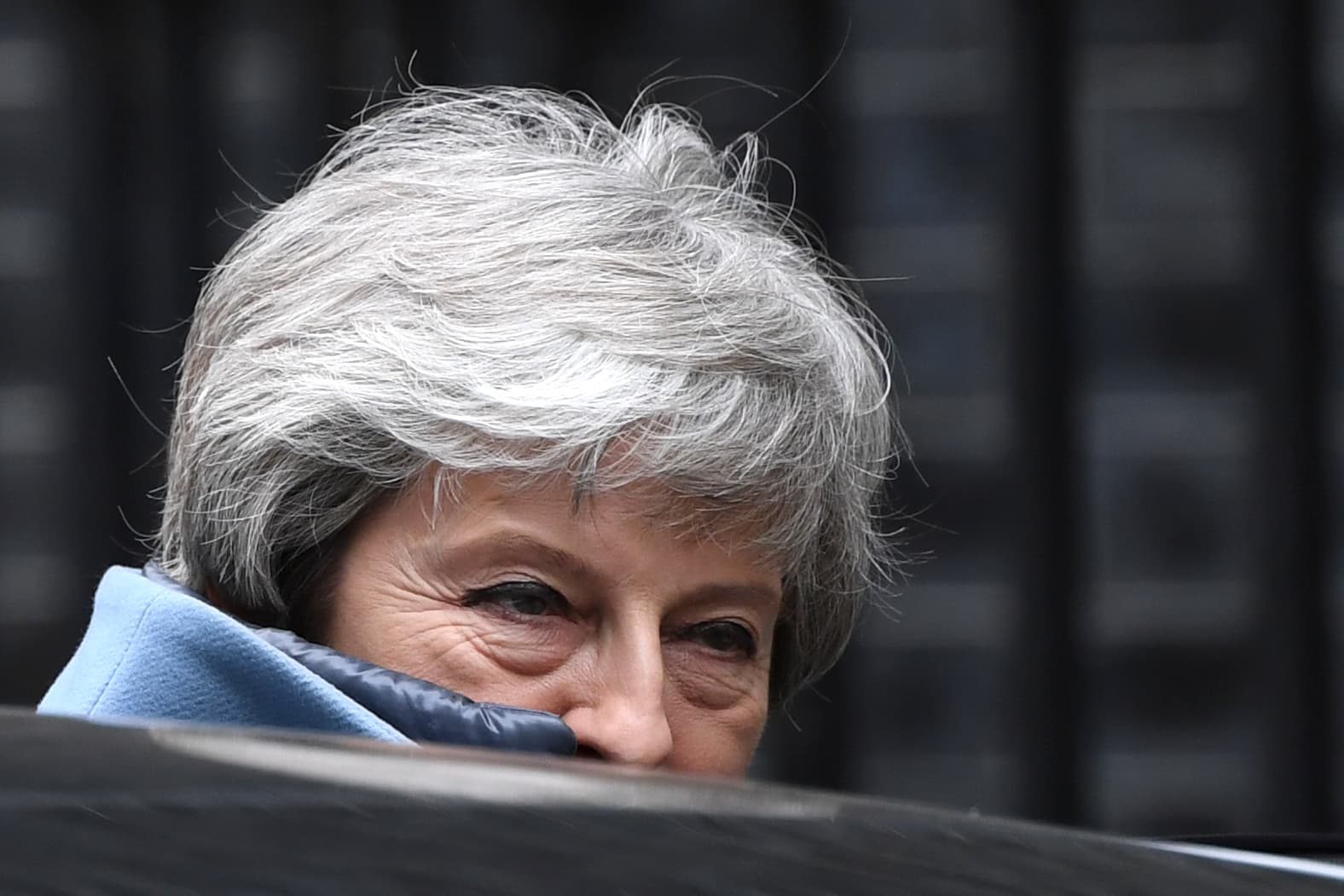 Why on earth is Theresa May looking smug?