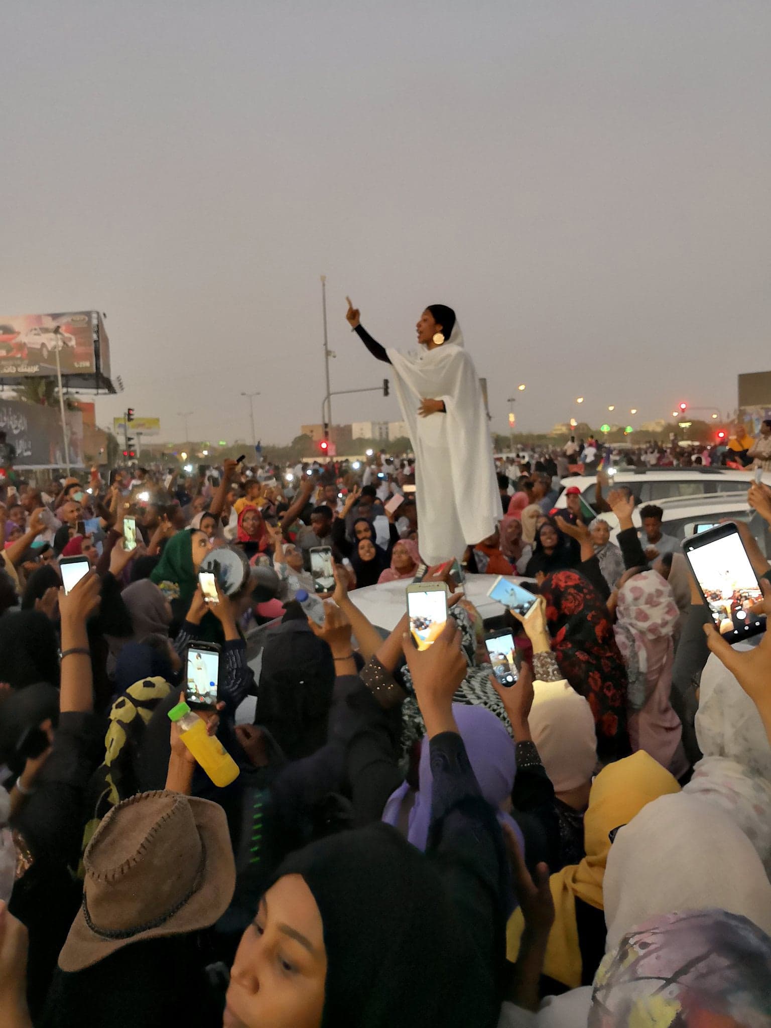 One woman's act of defiance captures Sudan's watershed moment