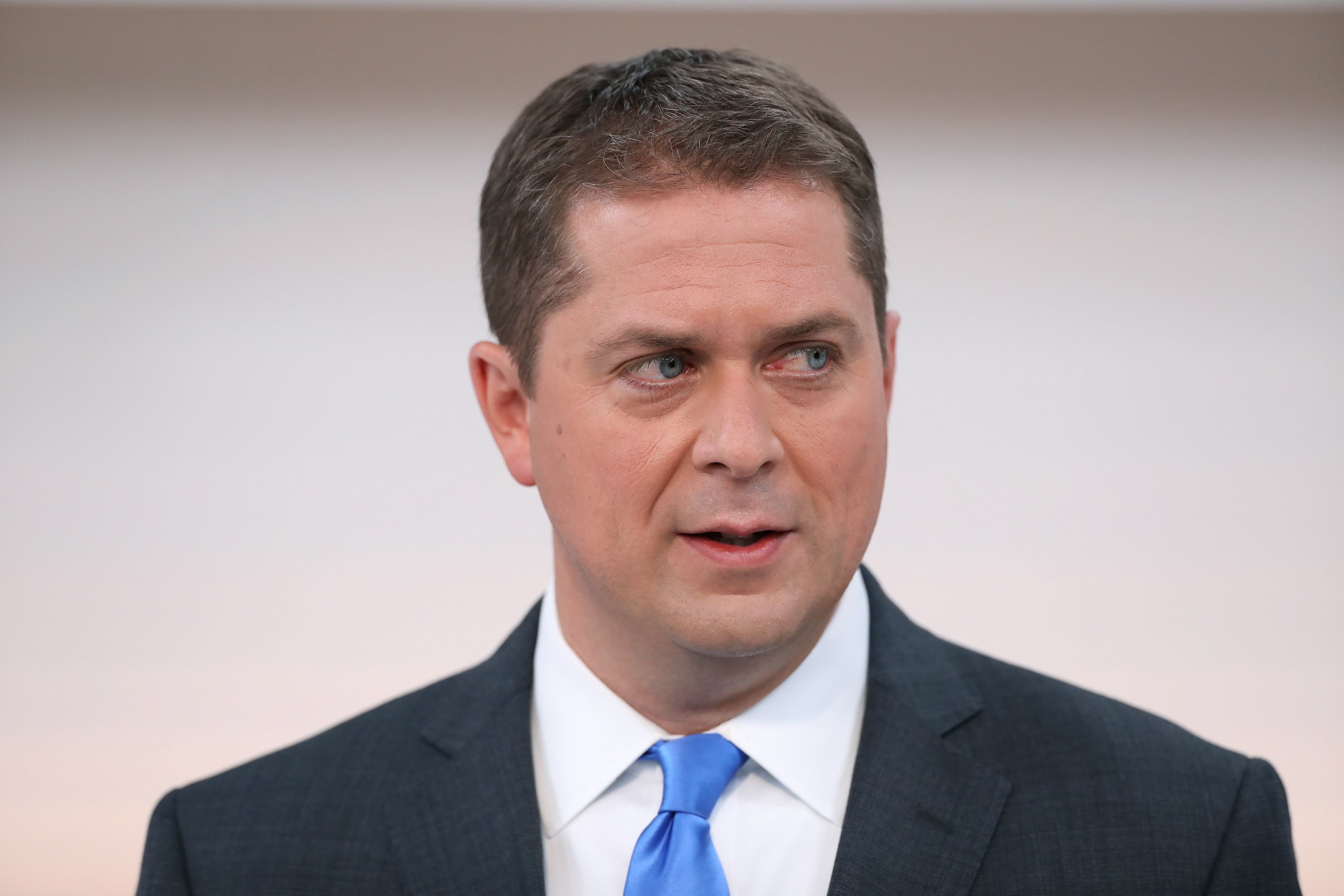 Andrew Scheer glowers at the Man Who Wasn't There