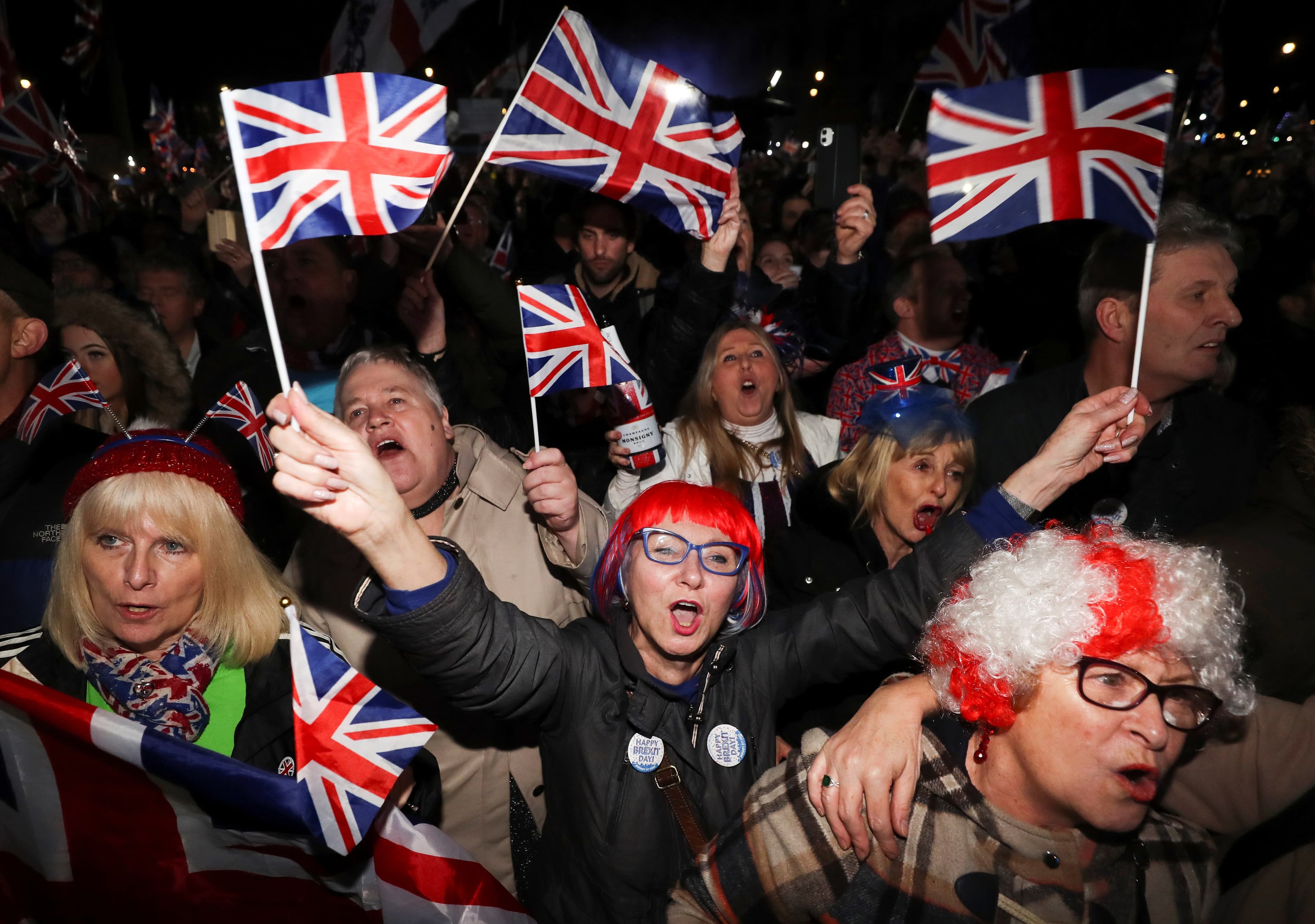 People celebrate in Parliament Square on Brexit day in London, Britain January 31, 2020. (Simon Dawson/Reuters)