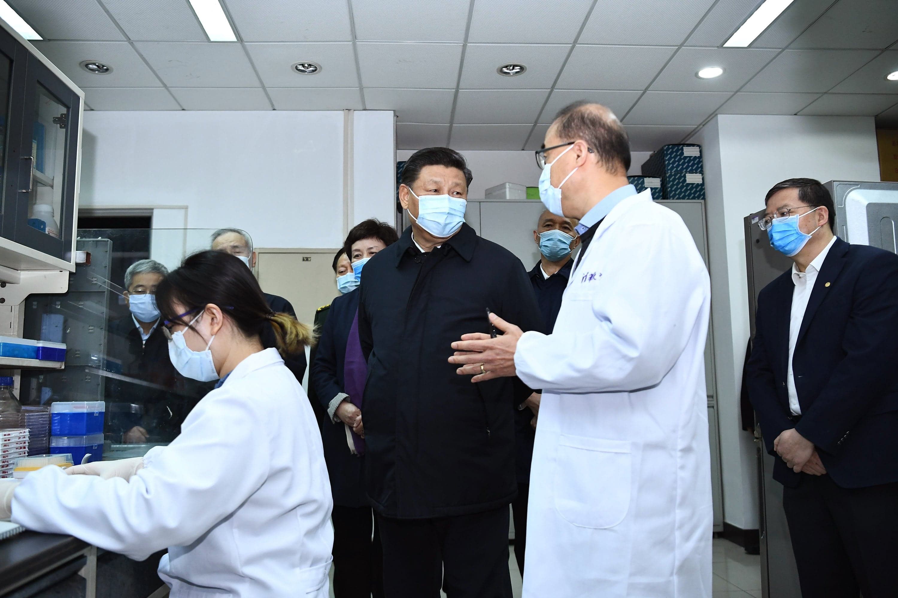 Chinese President Xi Jinping talks with experts during his visit to the School of Medicine at Tsinghua University in Beijing, China, March 2, 2020. (Yan Yan/Xinhua/Getty Images)