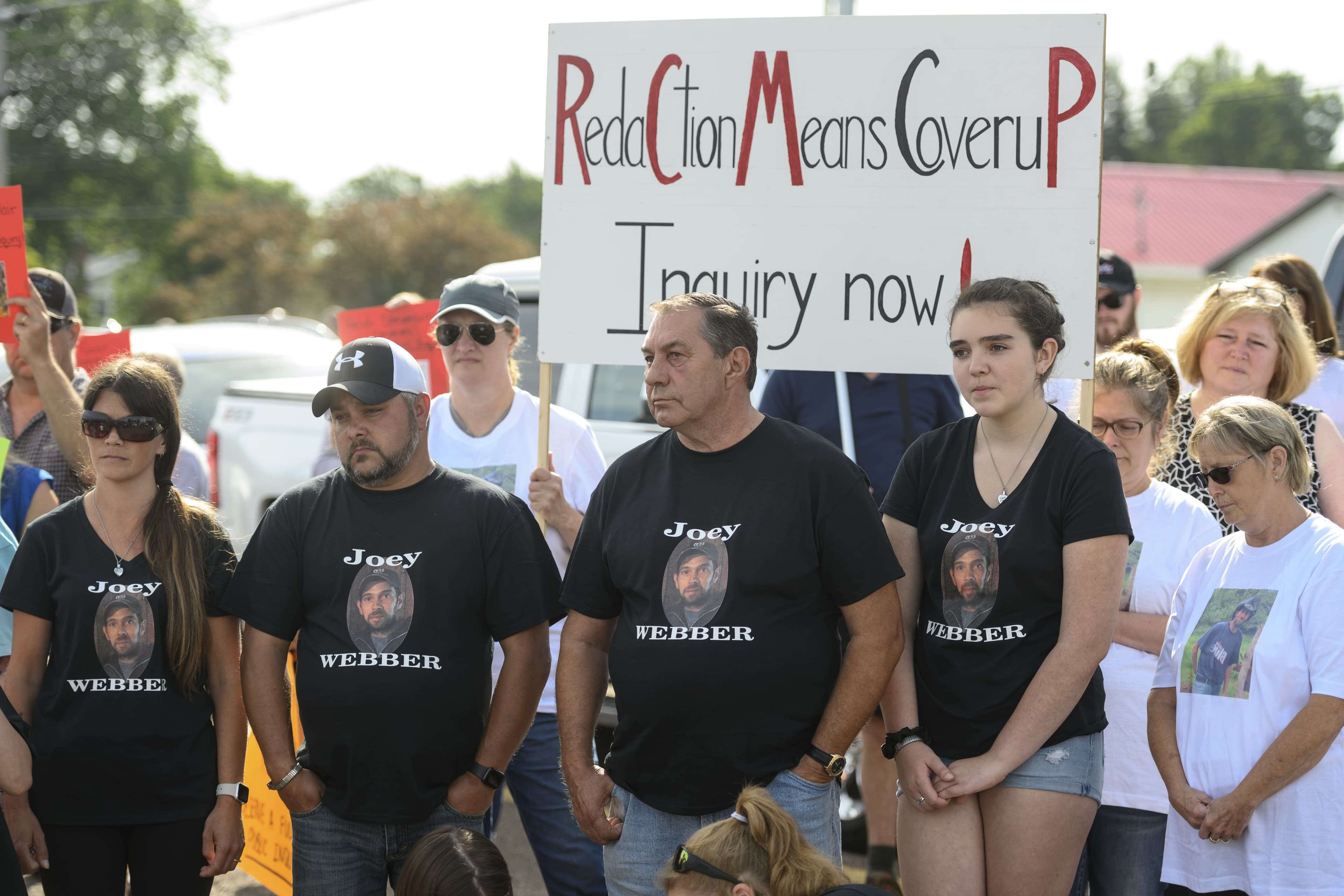 The family of Joey Webber gather with other families of victims to march in Bible Hill, N.S. on Wednesday, July 22, 2020 demanding a public inquiry into the RCMP's handling of Canada's deadliest rampage throughout rural Nova Scotia in April. (Photograph by Darren Calabrese)