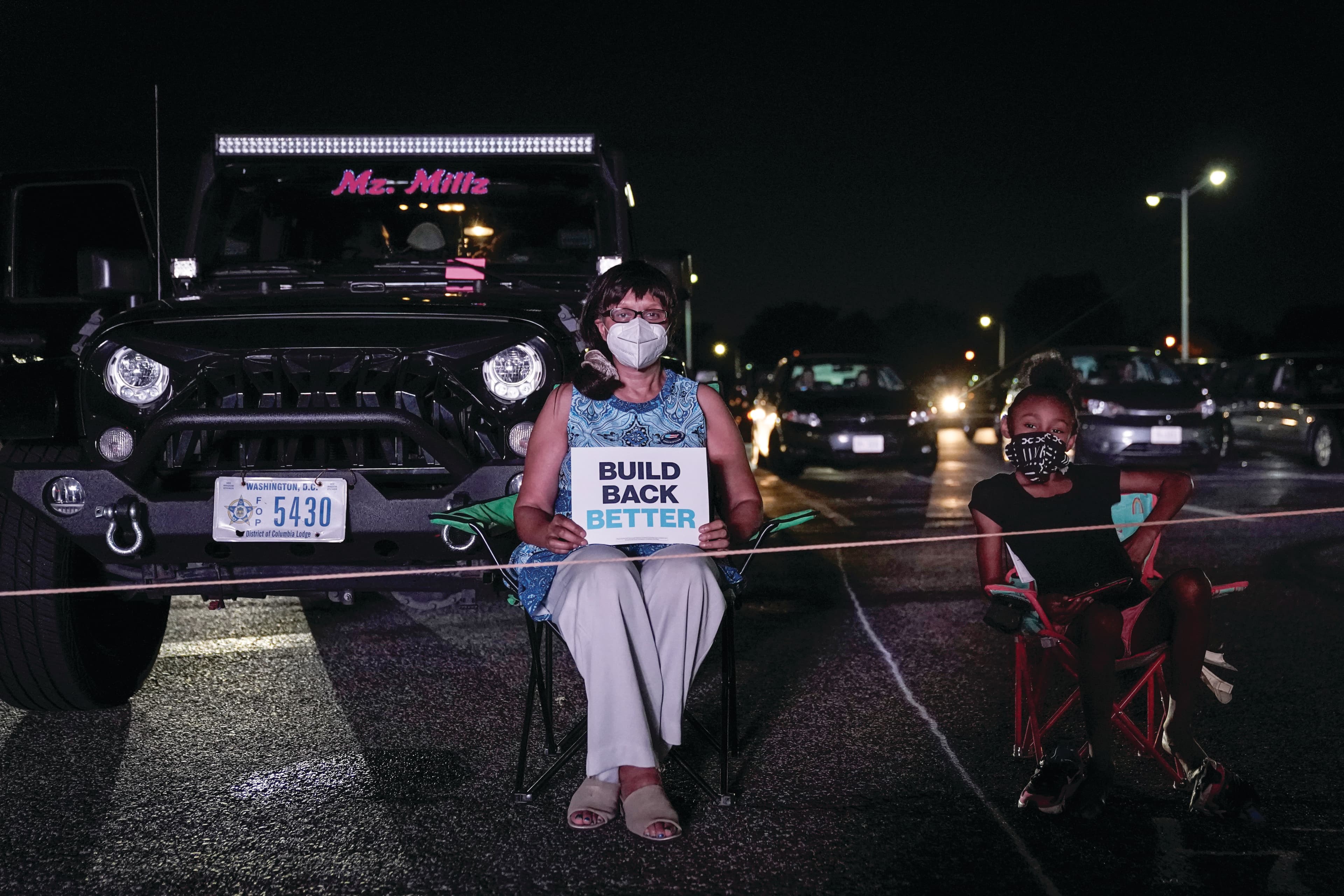 Supporters at a drive-in party watch Biden accept the Democratic nomination for president (Drew Angerer/Getty Images)