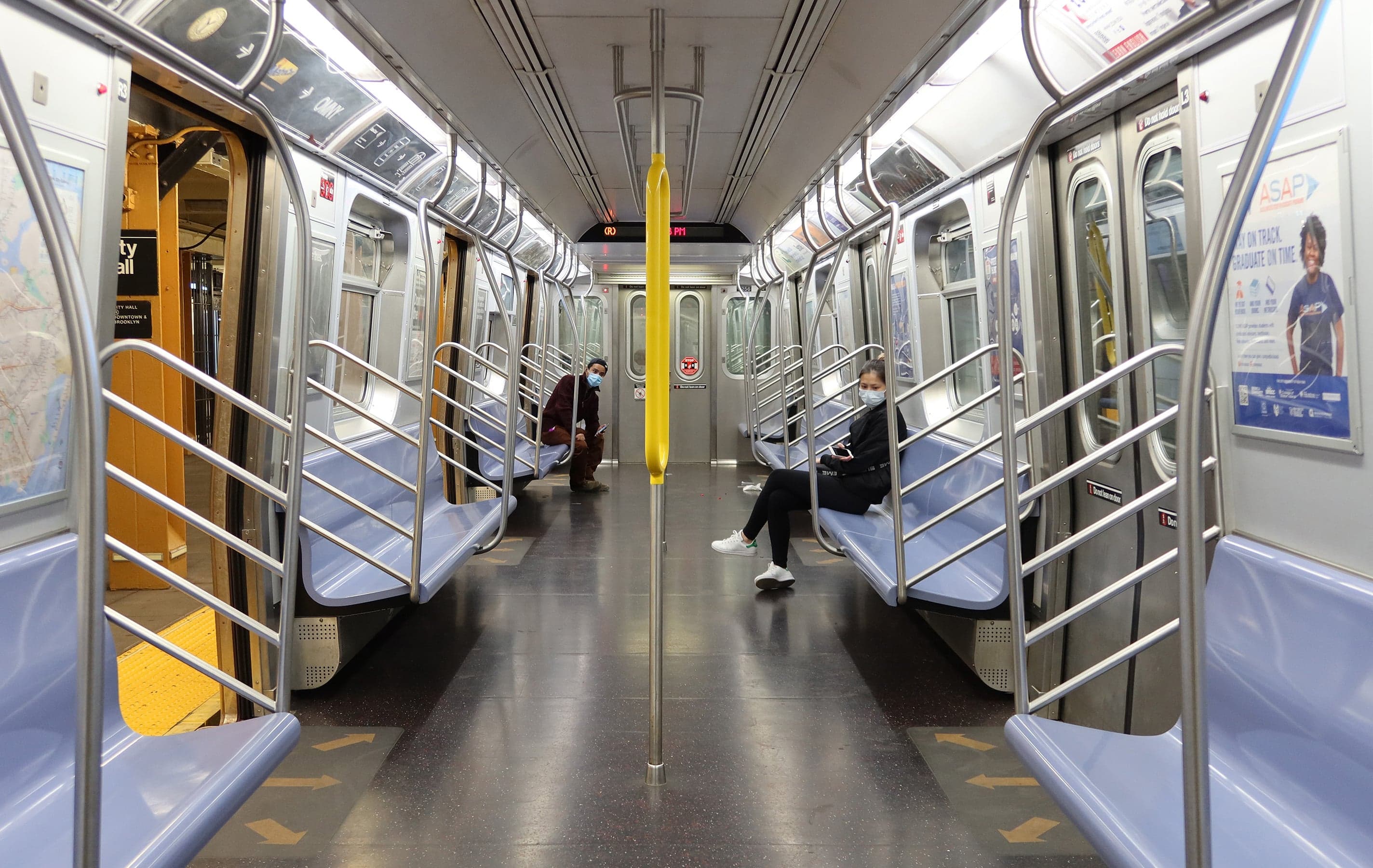 In many cities, subways to suburbs sit empty while packed buses move lower-paid urban workers (Gary Hershorn/Getty Images)