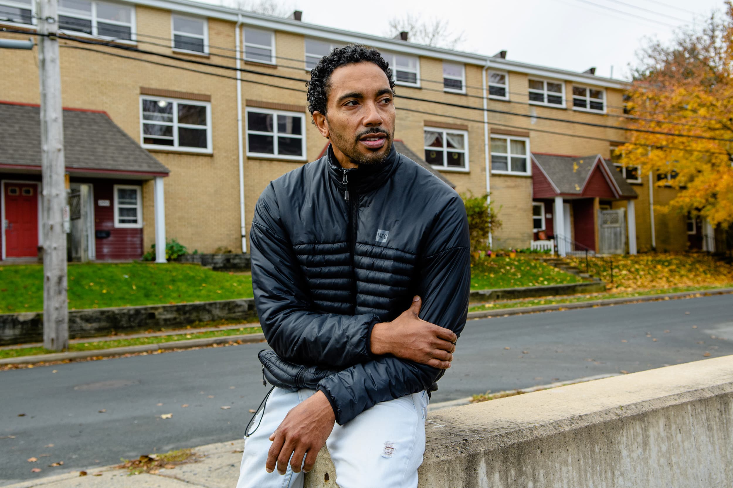 Rodney Small, Director of Common Good Solutions Inc. and One North End in front of Uniake Square, a public housing residential area in North End Halifax NS. (Aaron McKenzie Fraser)