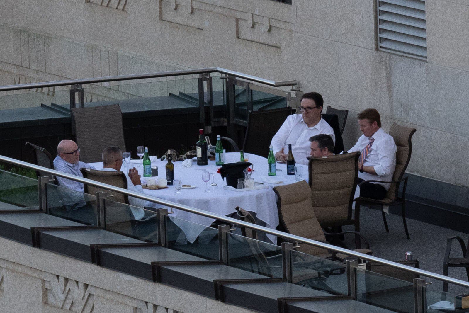 Jason Kenney, his ministers and a couple bottles of red