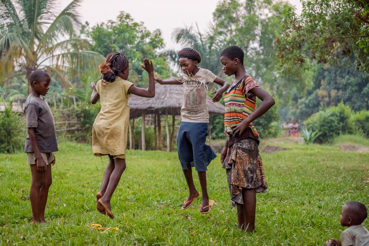 Marie - child in the DRC playing a game