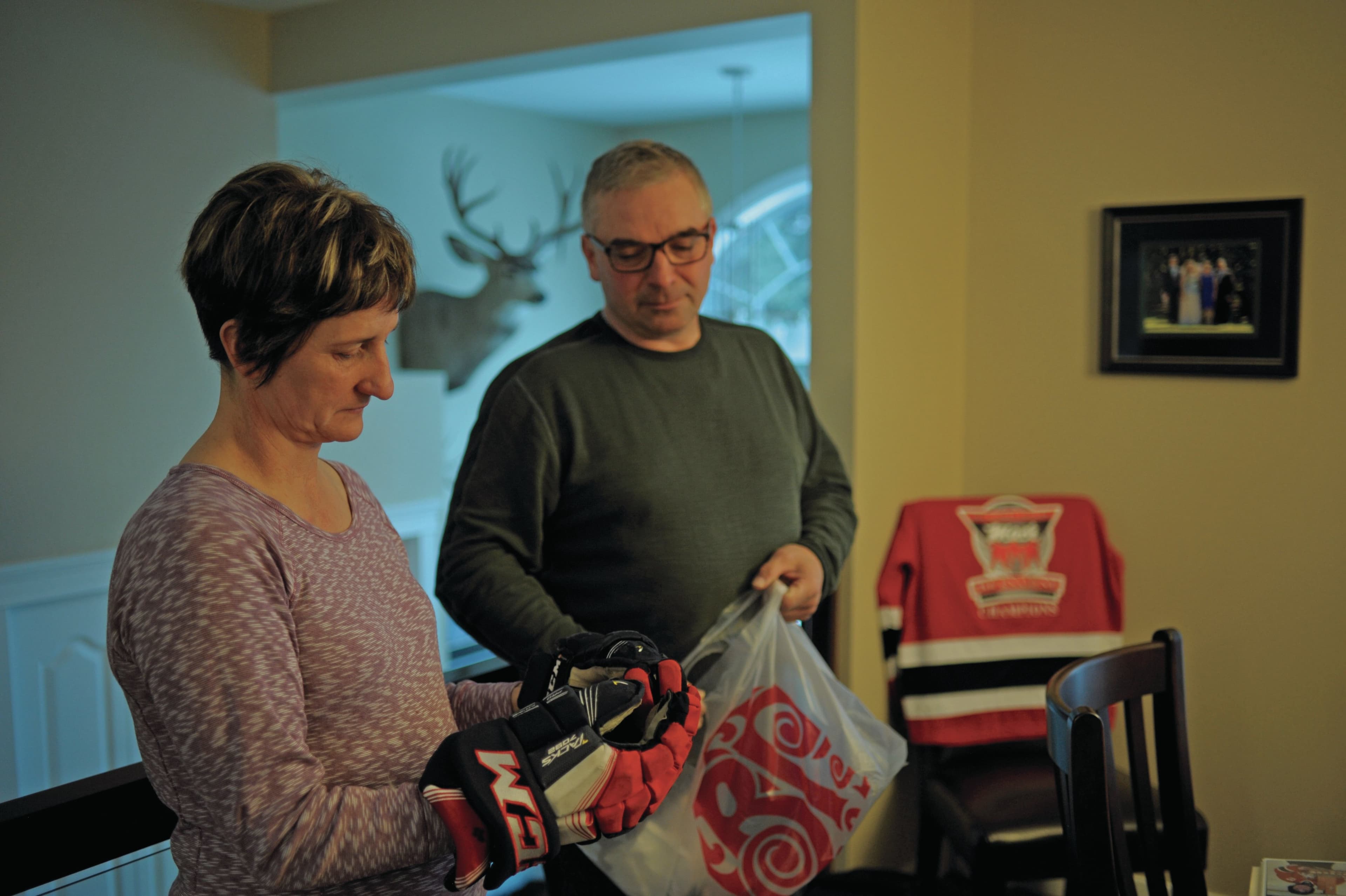 Raelene and Russell Herold go through their son Adam’s things at the farm (Photograph by Mark Taylor)