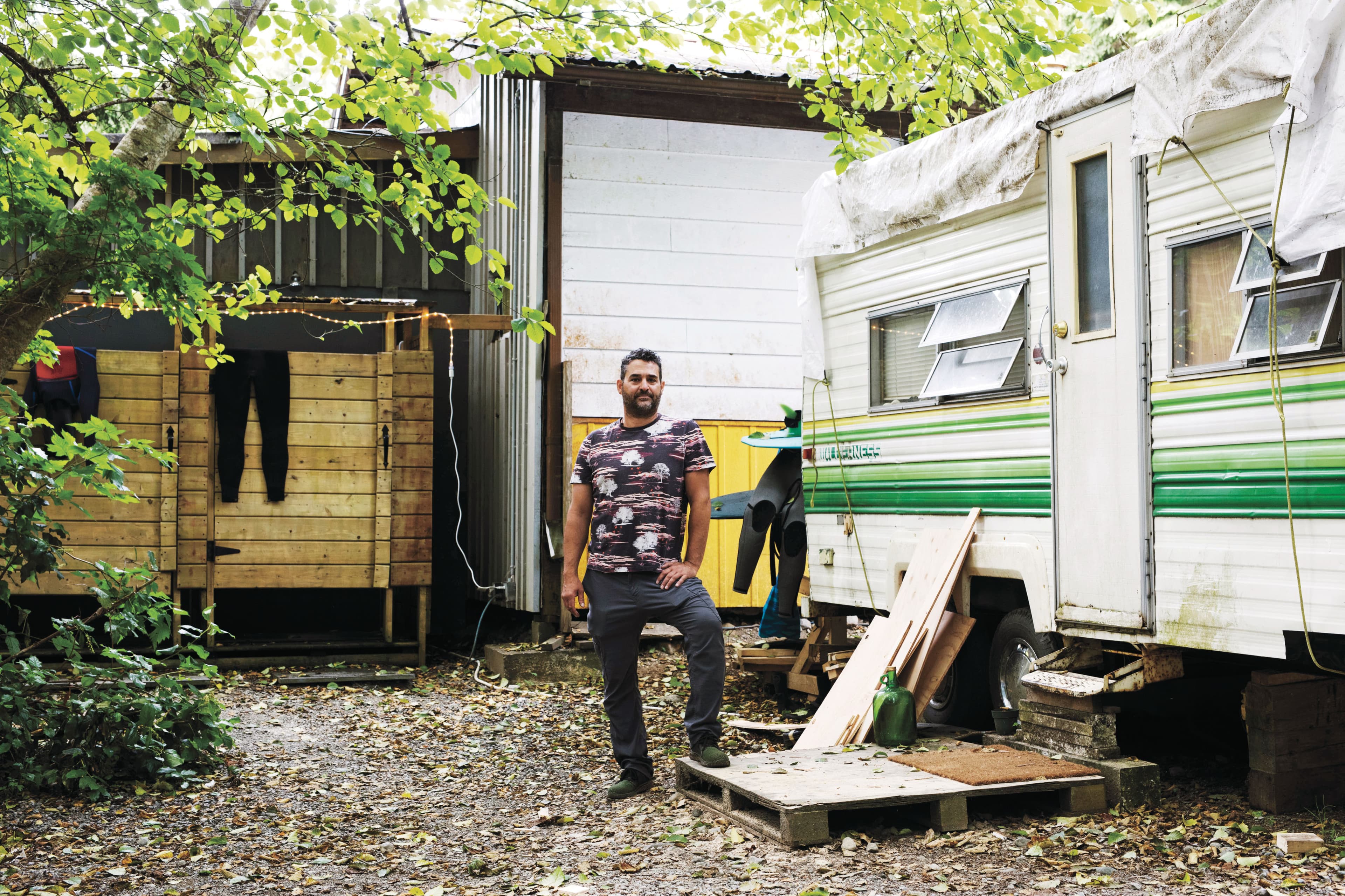 Crab Apple campground owner Mathieu Amin poses for a photo at the residential campground in Tofino, on July 8, 2021. Tofino's community mascot is a VW van with a surfboard on the roof, he described. "They're using it for marketing but they they don't actually want it," he said. (Photograph by Melissa Renwick)