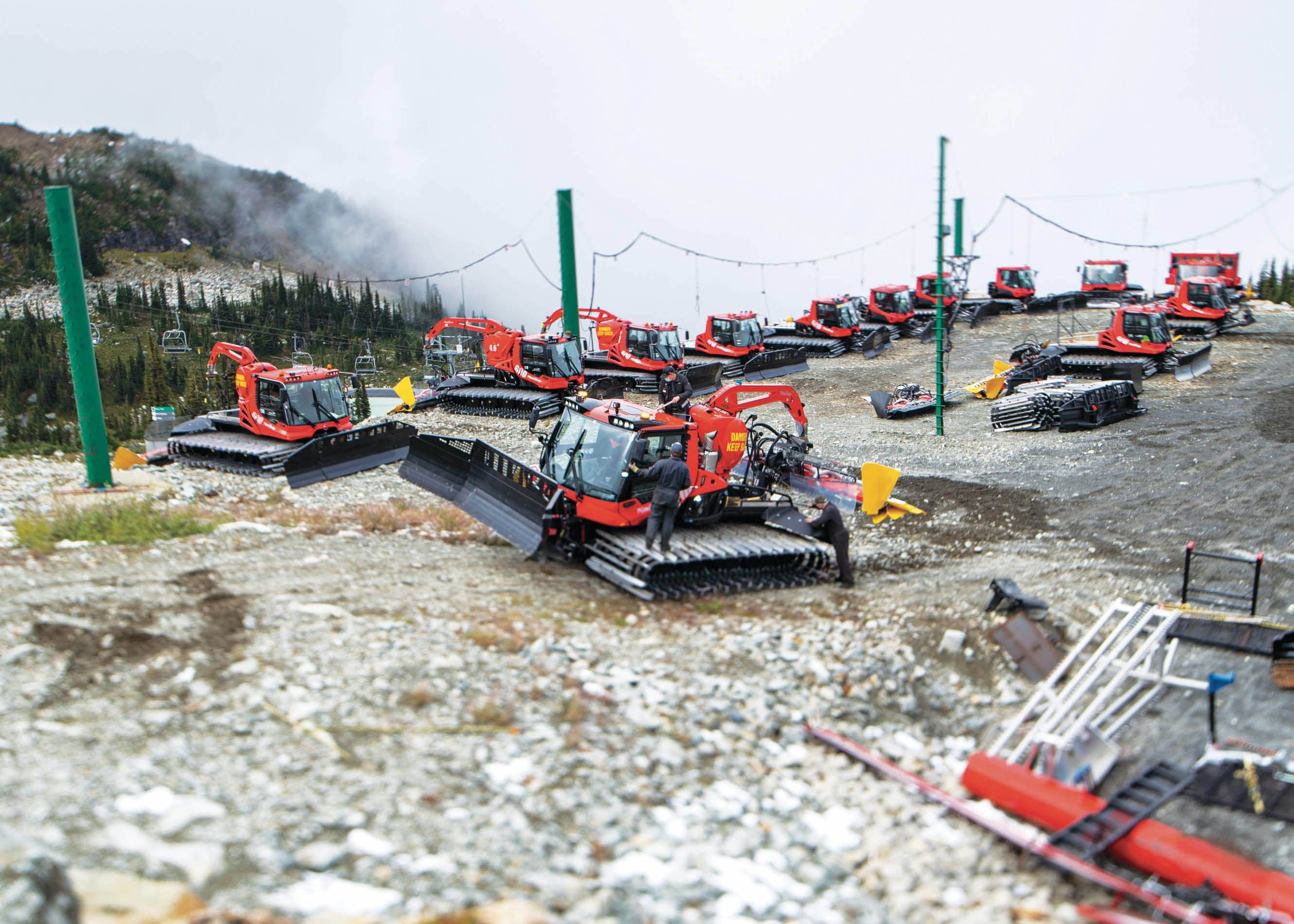 September 20, 2021 - Whistler, British Columbia - Crews work on maintaining snow grooming machinery. (Photograph by Jimmy Jeong)