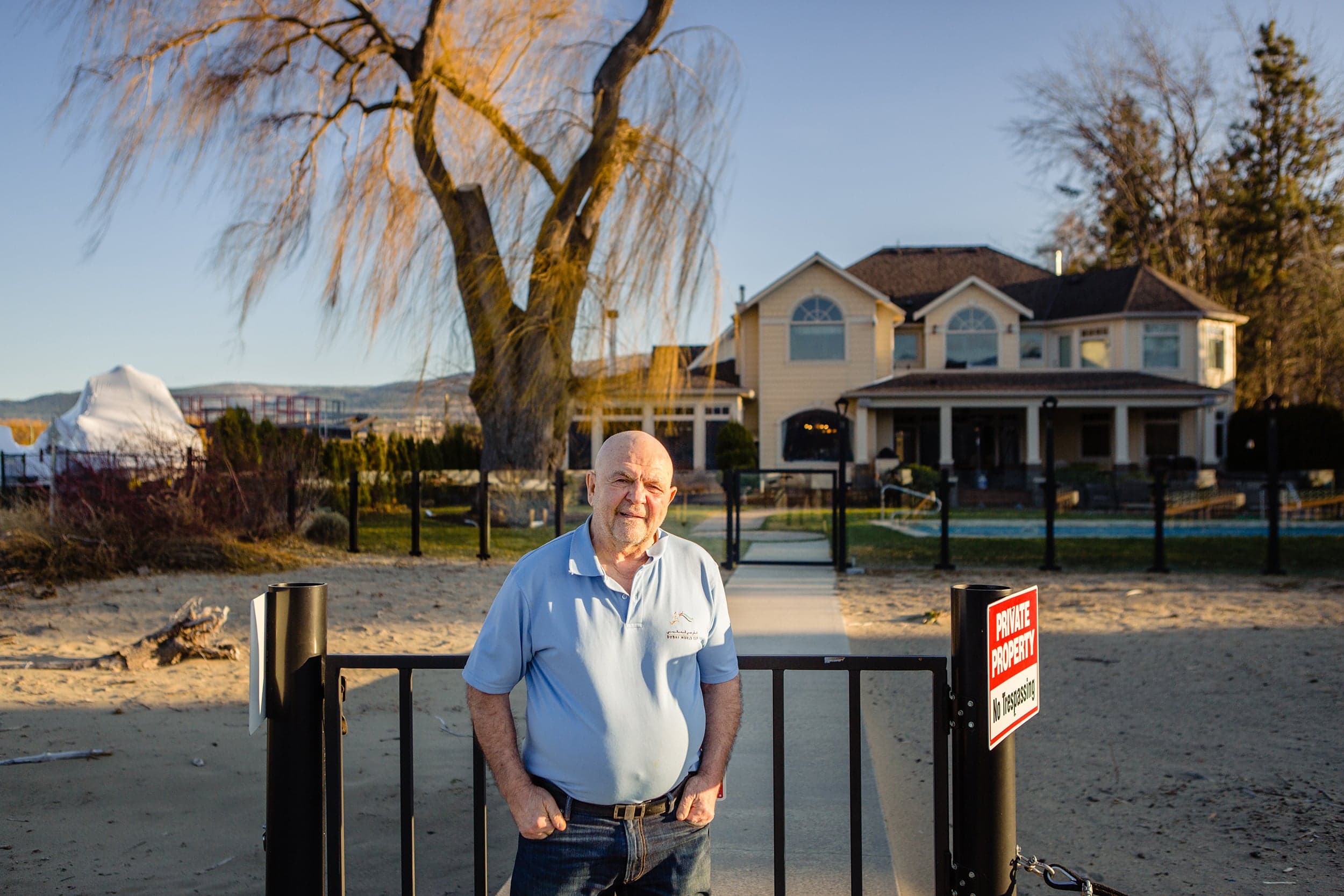 A developer is building condos in a Kelowna millionaire's front yard. Let the battle begin.