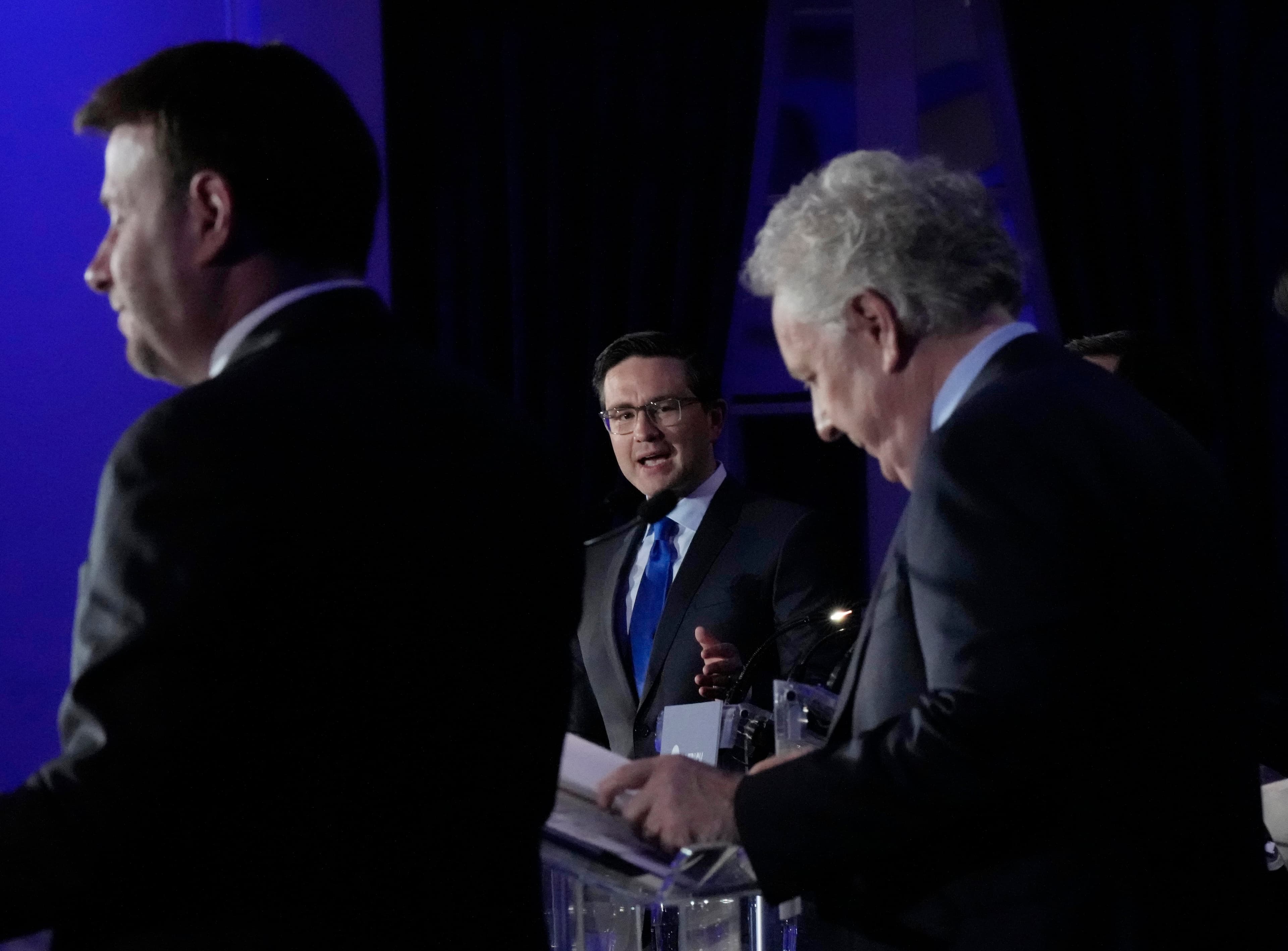 'Little coalition' of Charest and Brown spar with Poilievre