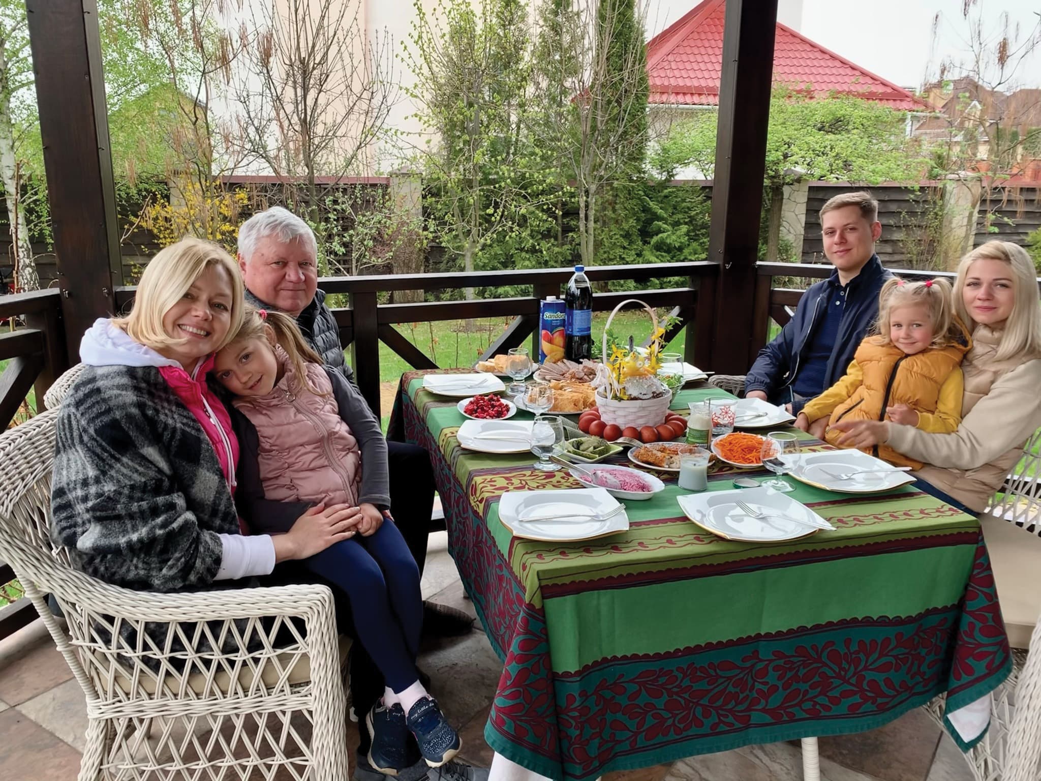 Yaroslava with her father, Amir, Iryna and nieces in her backyard garden at home in Kyiv.