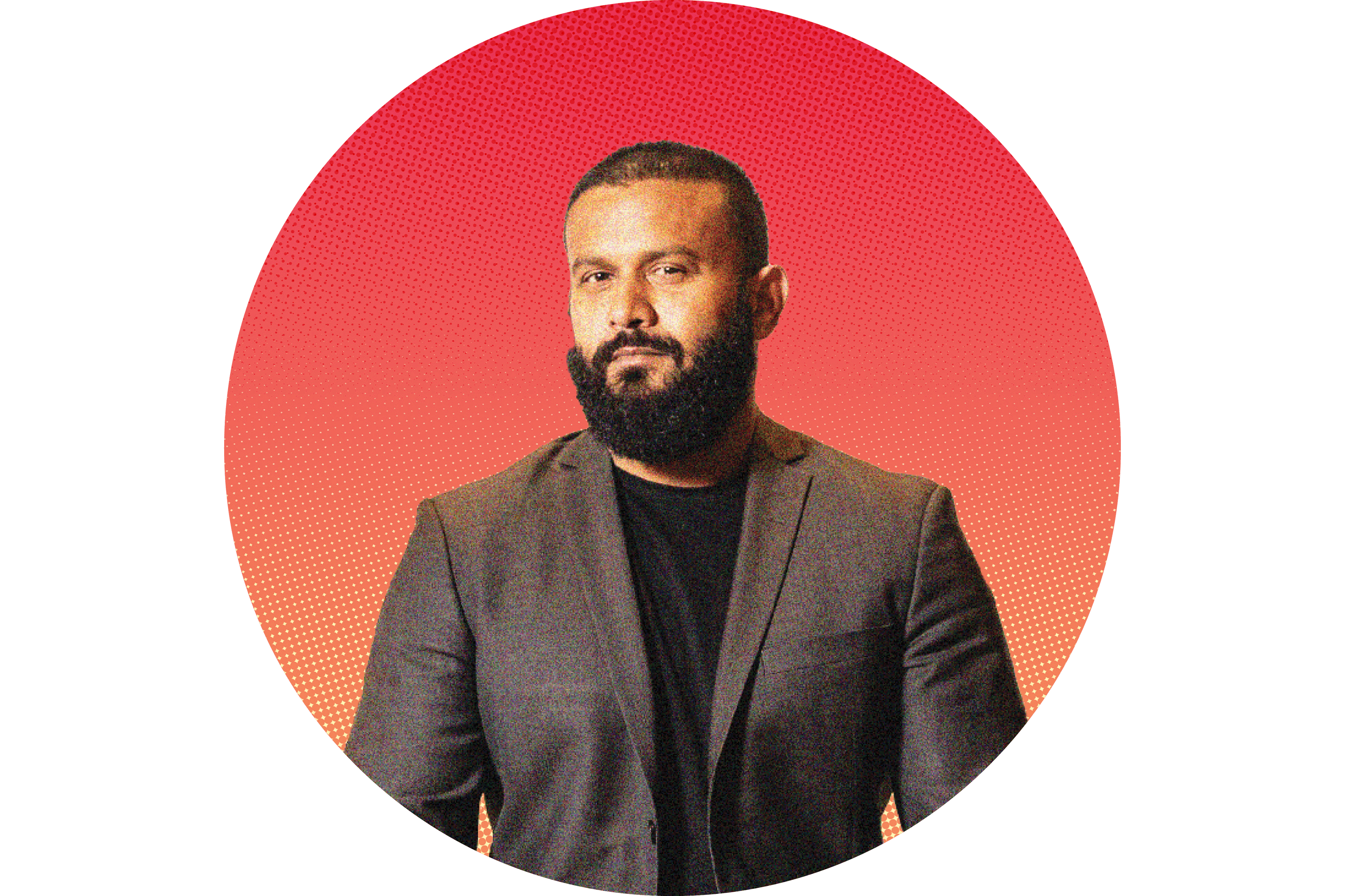 Dax Dasilva in a dark grey blazer and black shirt