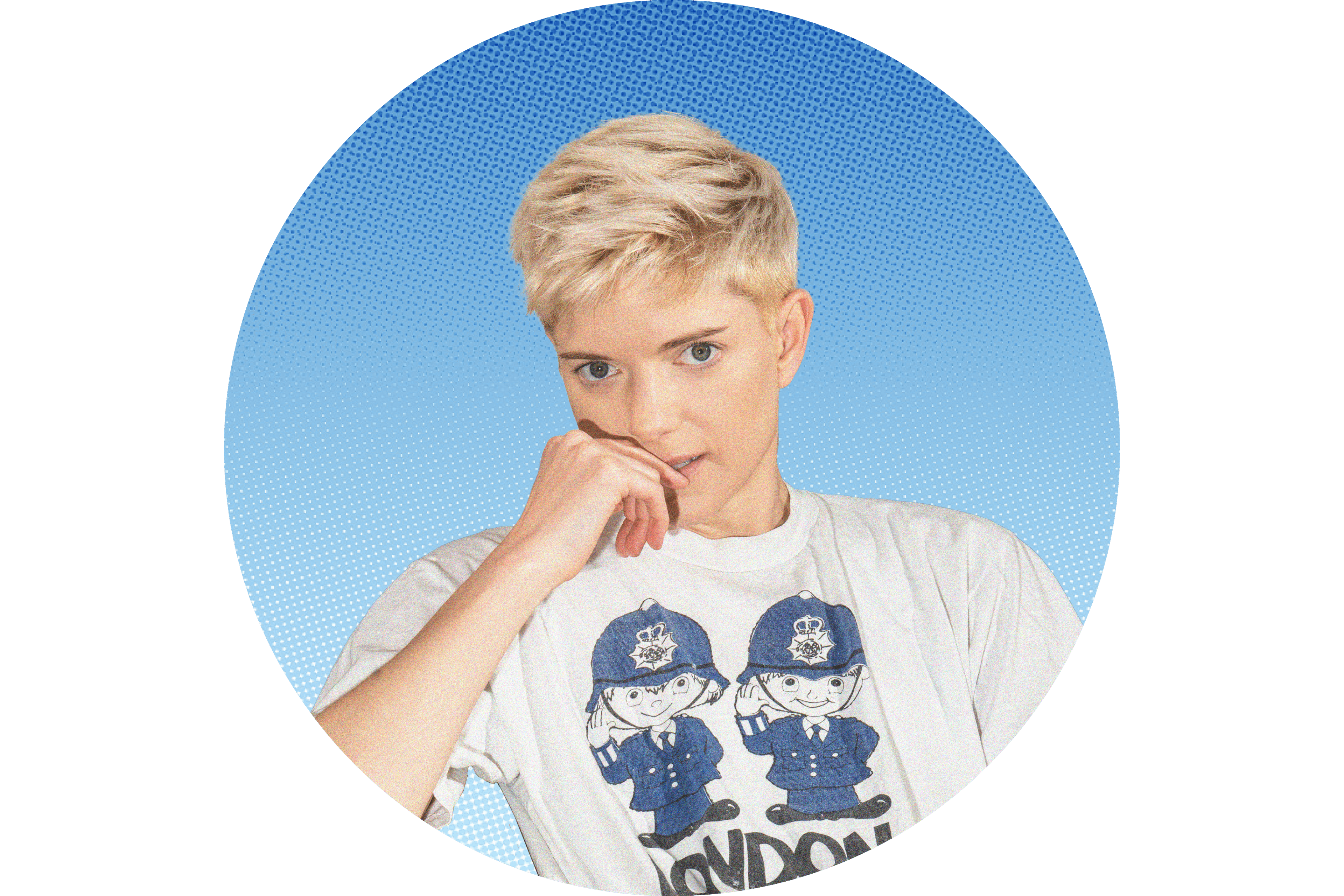 Mae Martin in a white graphic t-shirt