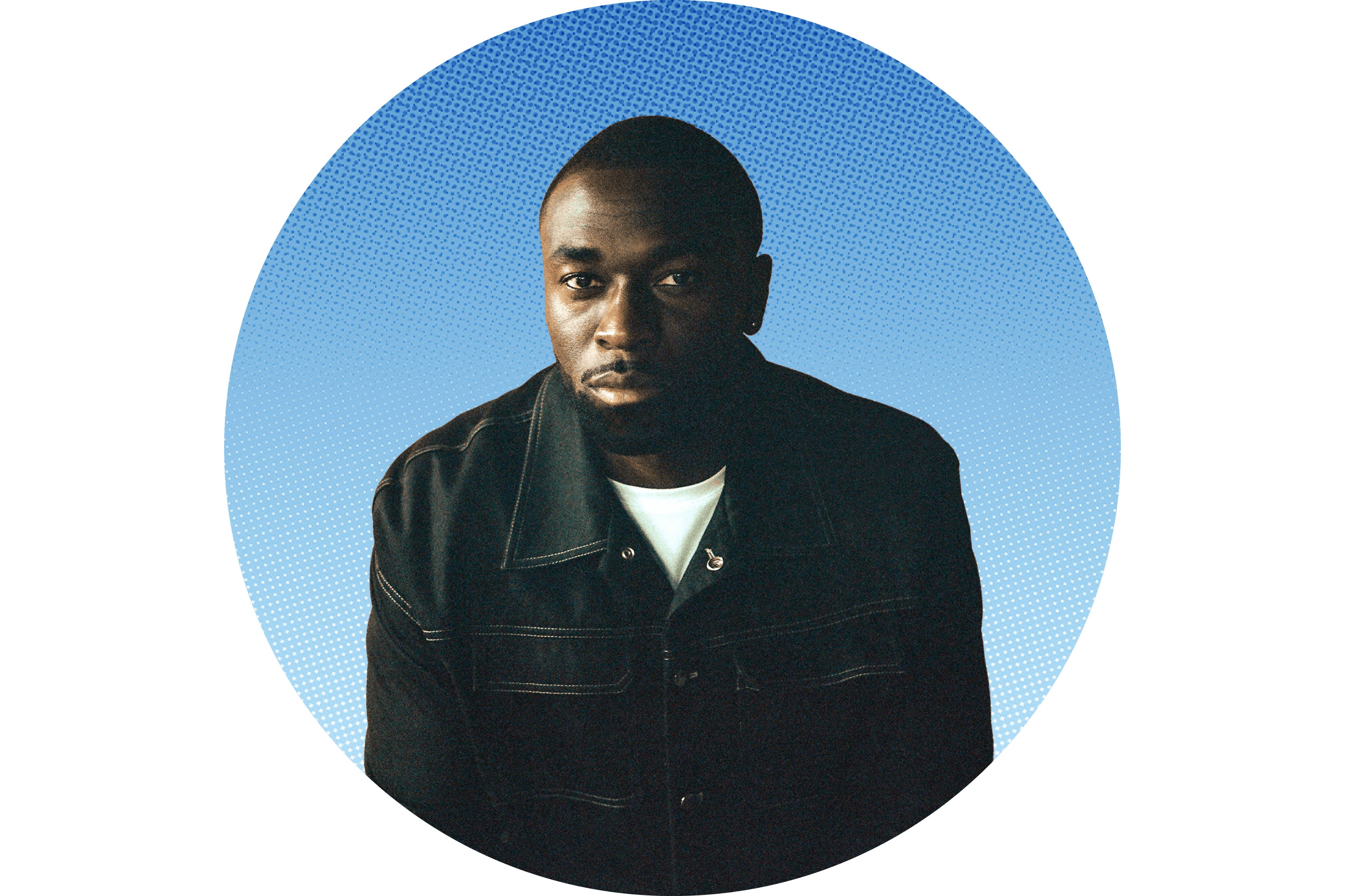 Spencer Badu in a white t-shirt under a dark overshirt