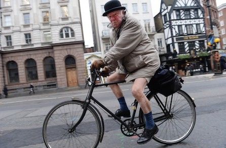 Man cycles in London