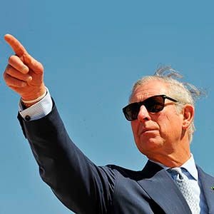 Britain&#8217;s Prince Charles gestures during a visit to a historical site under reconstruction in Al-Diriyah