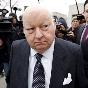 Suspended Senator Mike Duffy leaves the Ontario Court of Justice, in Ottawa