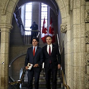 Canada&#8217;s Prime Minister Trudeau and Finance Minister Morneau walk to the House of Commons to deliver the budget on Parliament Hill in Ottawa