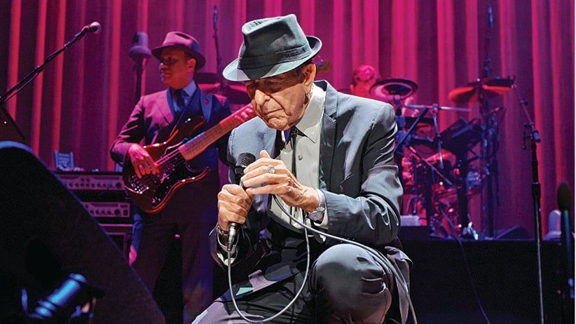 Leonard Cohen performs on stage at Leeds Arena on September 7, 2013 in Leeds, England. (Gary Wolstenholme/Redferns/Getty Images)