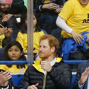 Britain&#8217;s Prince Harry, Prime Minister Justin Trudeau and Mayor John Tory cheer on sledge hockey atheletes during the Invictus Games media launch in Toronto