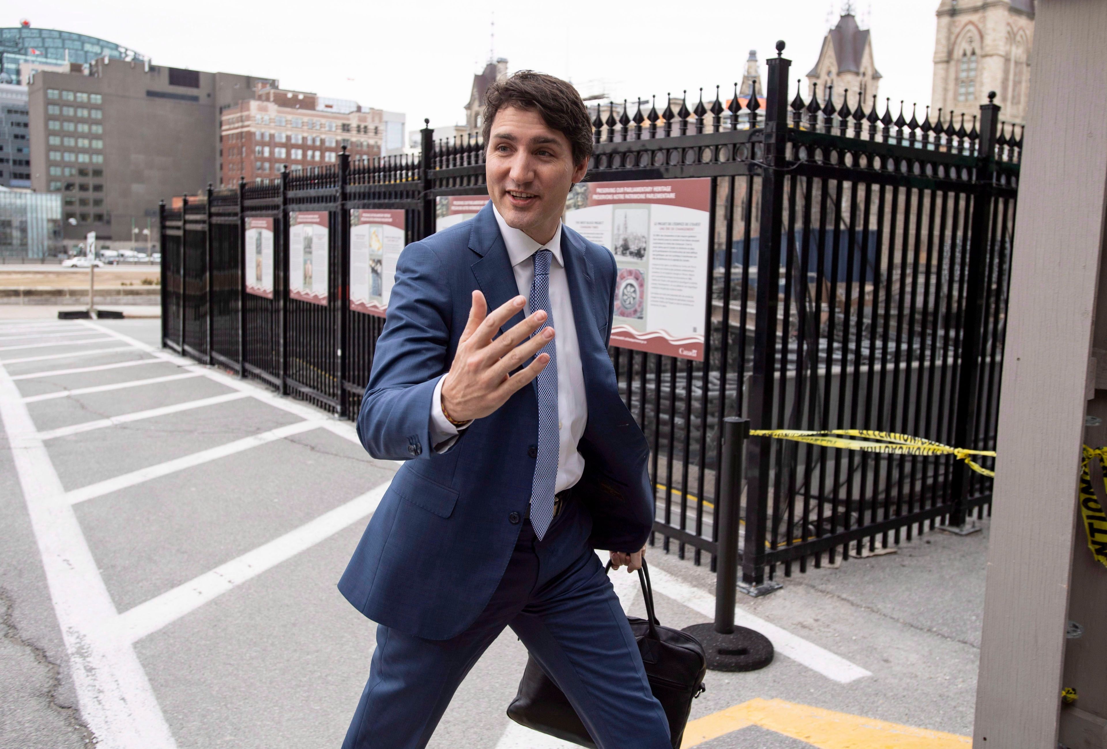 Prime Minister Justin Trudeau arrives on Parliament Hill before a meeting with B.C. Premier John Horgan and Alberta Premier Rachel Notley, on the deadlock over Kinder Morgan's Trans Mountain pipeline expansion in Ottawa on Sunday, April 15, 2018. (Justin Tang/CP)