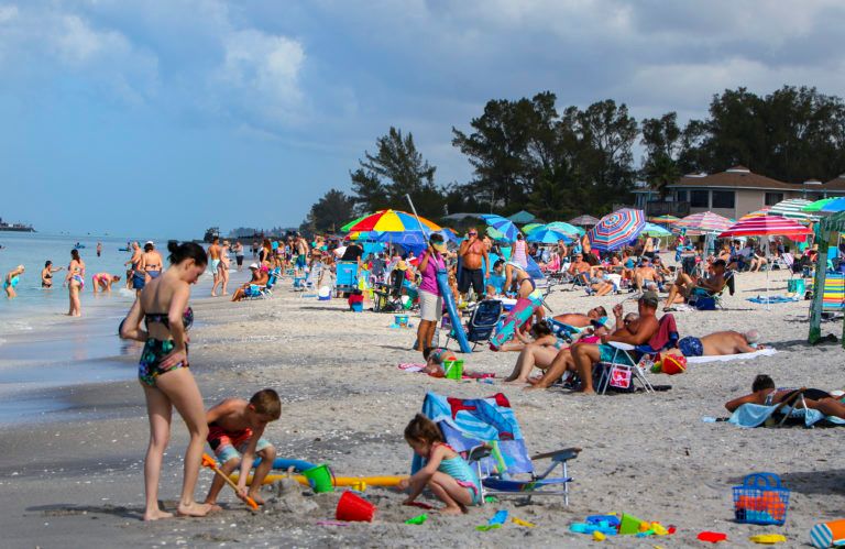 Englewood Beach in Charlotte County, Fla., was crowded on March 20, 2020. It was closed to the public starting at 6 am the following day (Thomas O'Neill/NurPhoto via Getty Images)