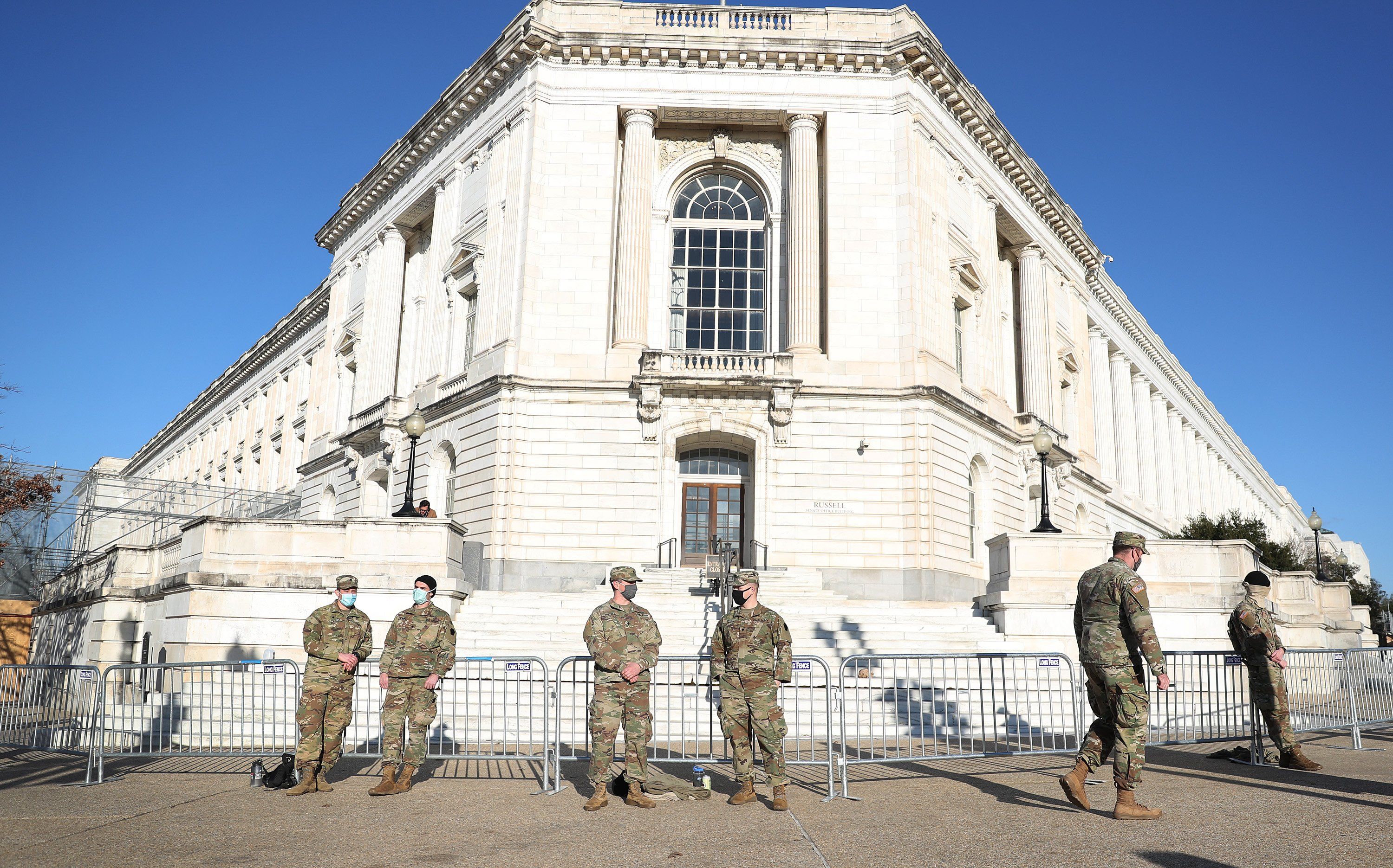 Maryland National Guard members stand guard around the Russell Senate Office Building a day after a pro-Trump mob broke into the U.S. Capitol Building on Jan. 07, 2021 (Joe Raedle/Getty Images)