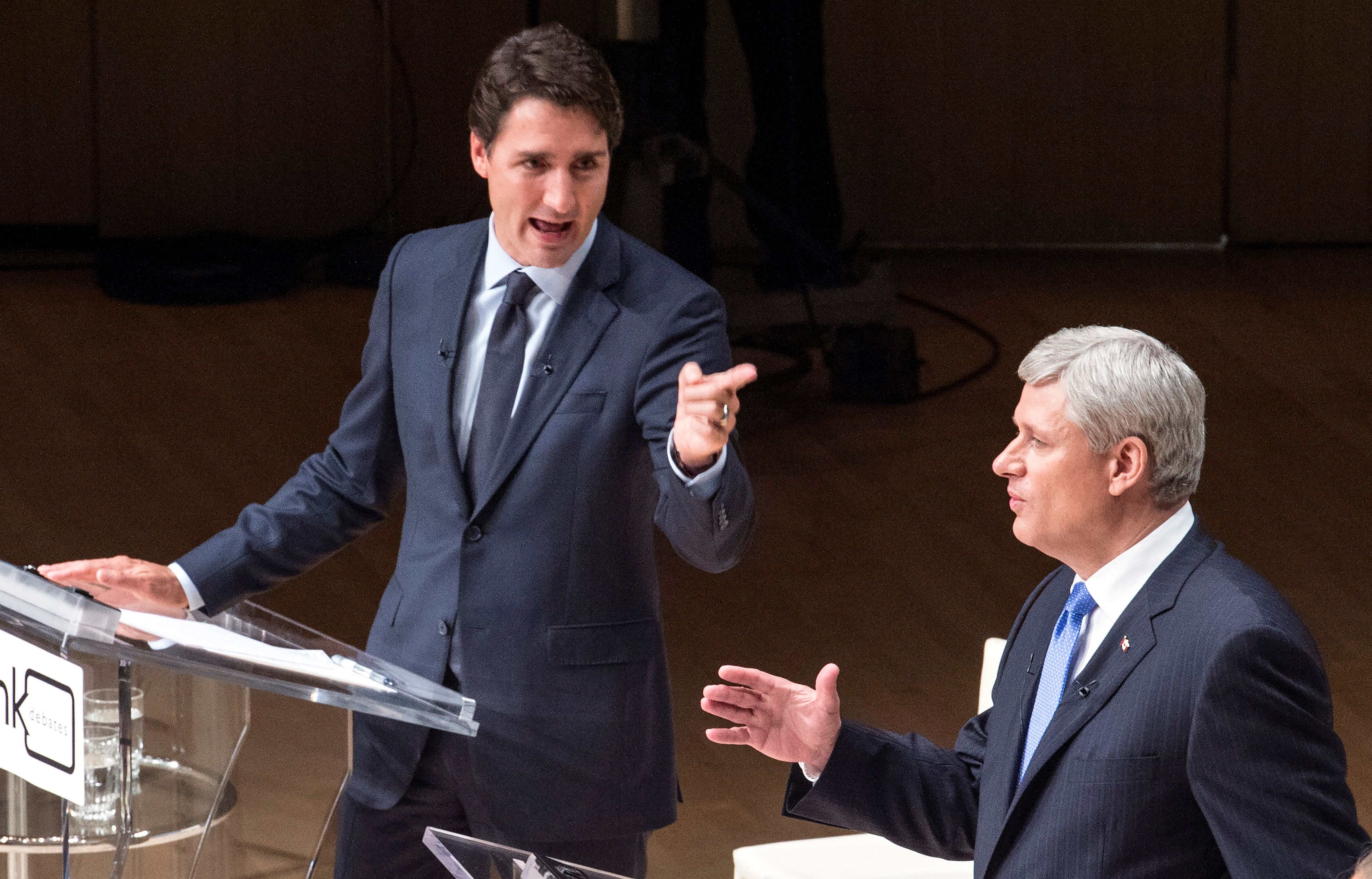 Trudeau and Harper trade words during the Munk Debate on foreign affairs, in Toronto, on Sept. 28, 2015 (Andrew Vaughan/CP)