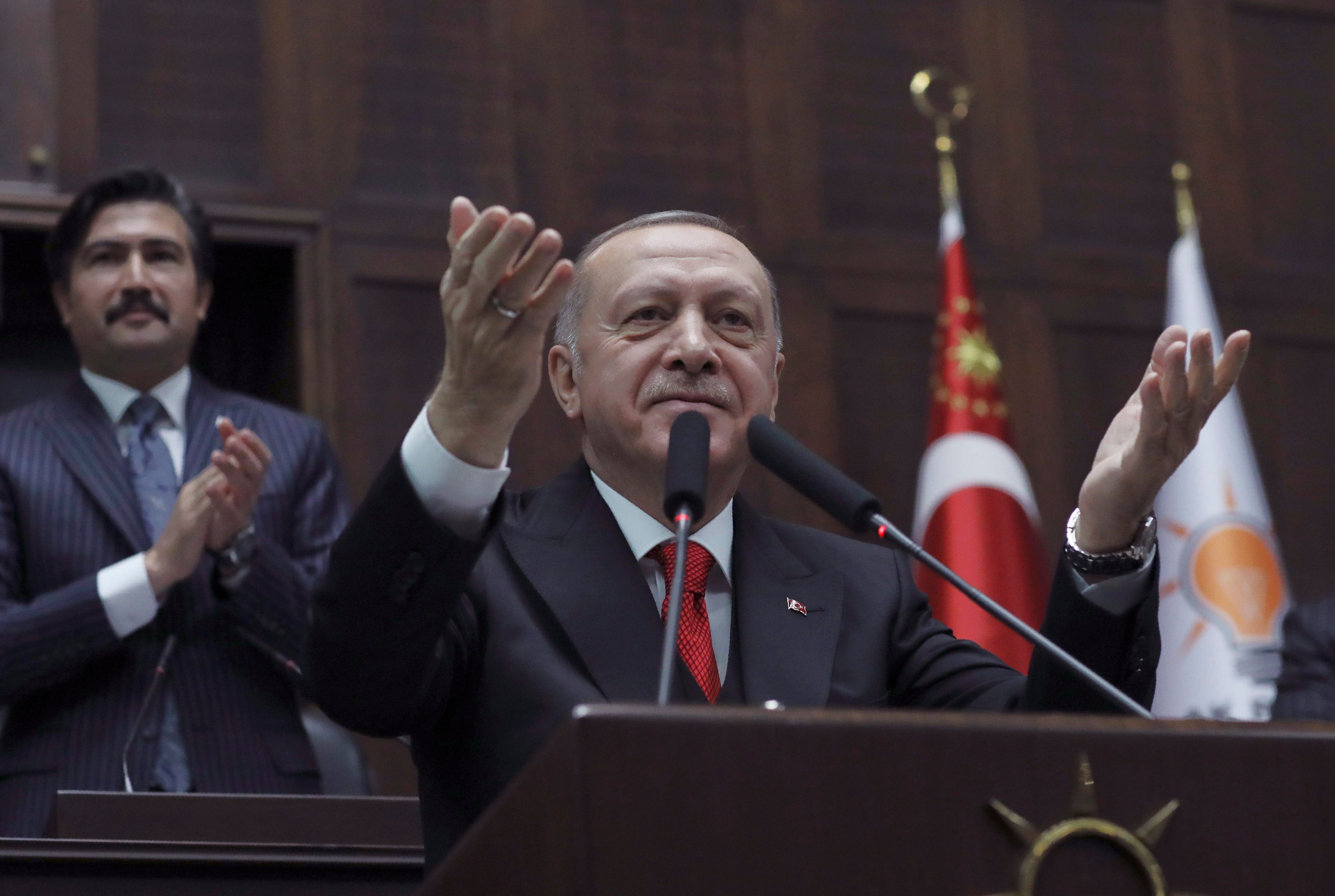 Erdogan addresses his ruling party members at the parliament, in Ankara, Turkey, on Feb. 12, 2020 (AP Photo/Burhan Ozbilici)