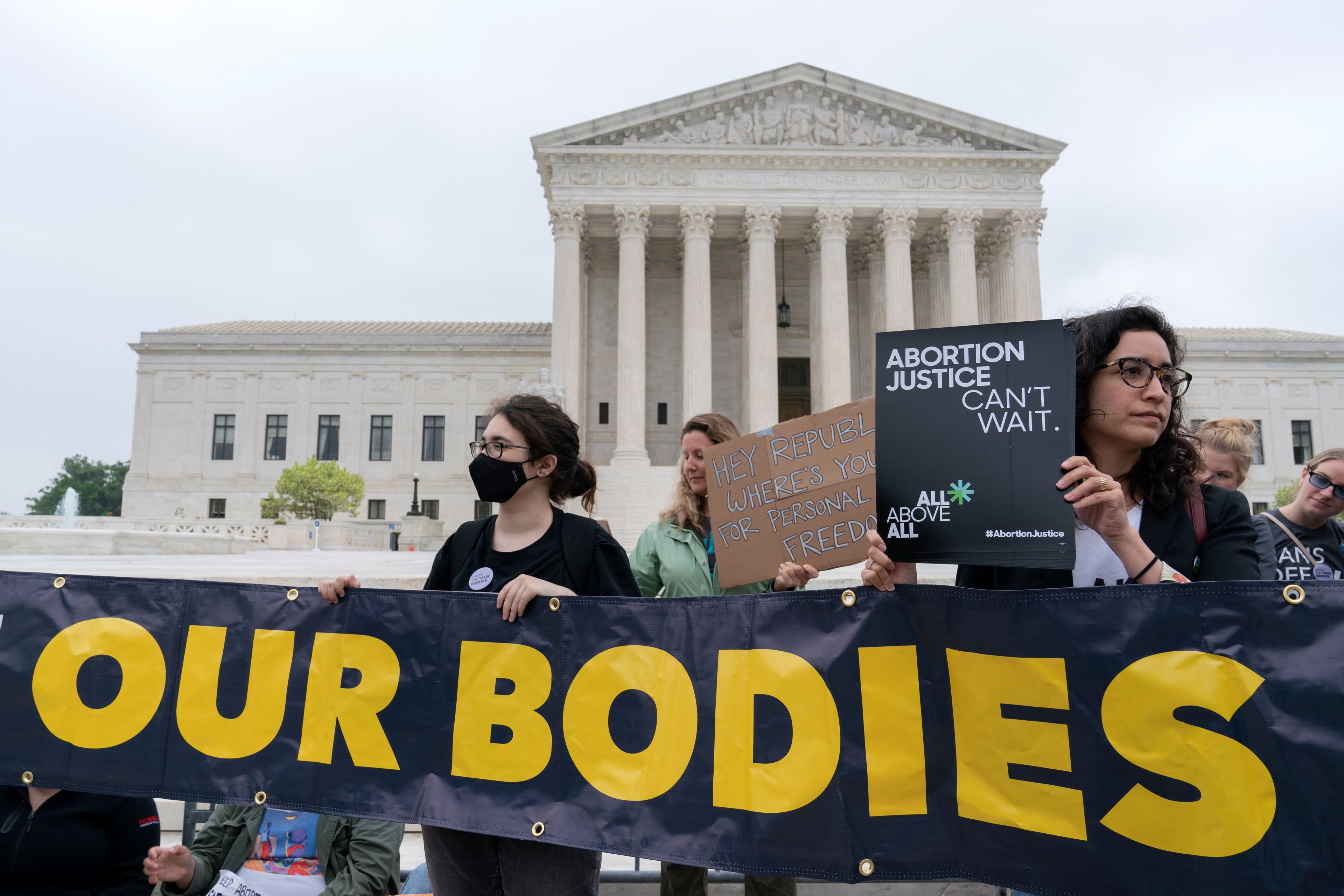 Demonstrators protest outside of the U.S. Supreme Court Tuesday, May 3, 2022 in Washington. (Jose Luis Magana/Associated Press)
