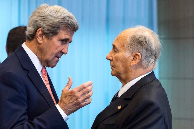 U.S. Secretary of State John Kerry, left, talks with Prince Aga Khan during a Conference on Afghanistan in Brussels, Wednesday, Oct. 5, 2016. The two-day conference, hosted by the EU, will have the participation of over 70 countries to discuss the current situation in Afghanistan. (AP Photo/Geert Vanden Wijngaert)